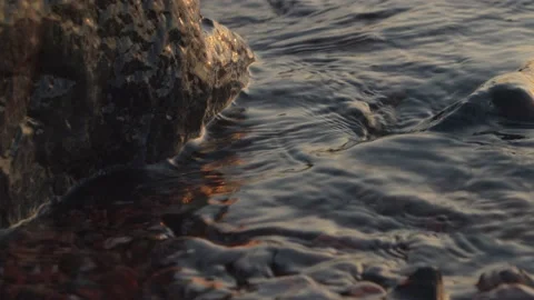 Slow motion water lapping at rocks in Helsinki, Finland Stock Footage 146262770