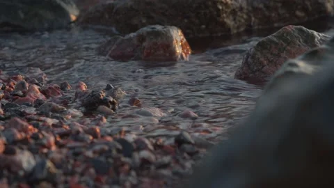 Slow motion water lapping at rocks in Helsinki, Finland Stock Footage 146263387