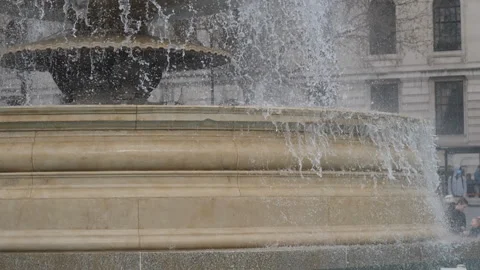 Slow Motion. Water pouring out of a fountain. Stock Footage 201209654
