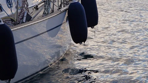 Slow motion water reflection on sailing boat in Mediterranean, Sicily, Italy Stock Footage 130127901