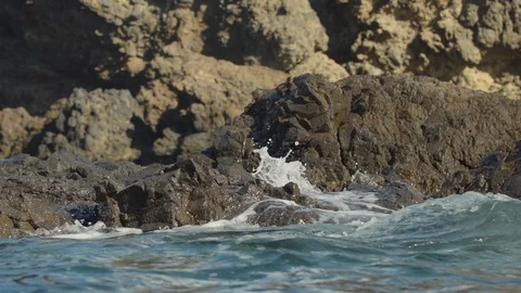 Slow-motion of water on rocks 스톡 동영상 88285901