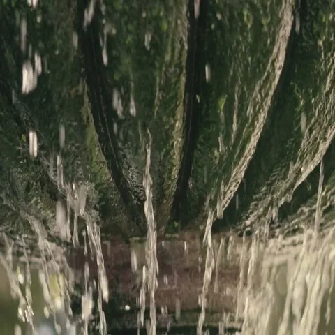 Slow Motion Water Running Down Fountain Front High Stock Footage 69562022