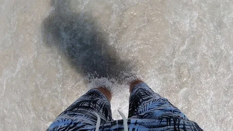 Slow Motion Water Rushing Under Feet Stock Footage