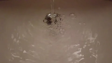 Slow motion water sink Stock Footage 168374095