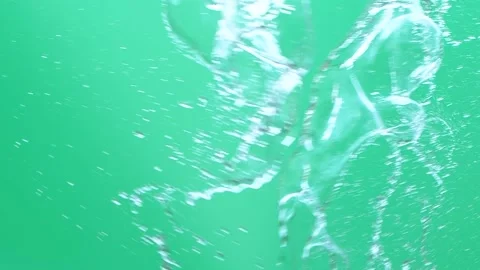 Slow motion of water spash with drops over green screen chroma key background Vídeos de archivo 166077368