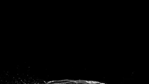 Slow motion of water splash abstract particle on black background Stock Footage 125788534
