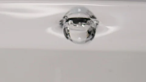 Slow motion water splash and ripple Stock Footage 108018642