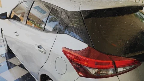 Slow motion water spraying car wash Stock Footage 93883053