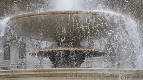 Slow Motion. Water streaming out of a fountain. Stock Footage 201209618