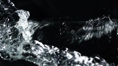 Slow motion water surface texture splash, waves and ripples on black background Stock Footage 170811032