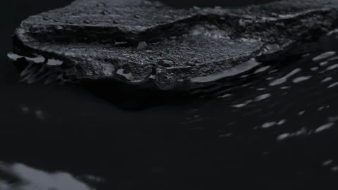 Slow motion water surface texture splashes, waves and ripples with black stone Vídeos de archivo 279799051