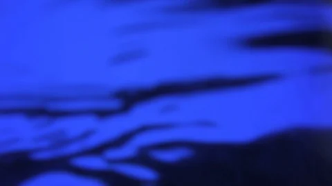 Slow motion of water surface waves with blurred bokeh towards the sunlight. Stock-Footage 91633461