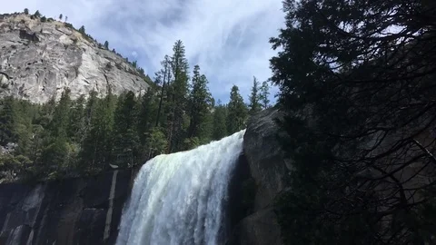 Slow Motion Waterfall camera move over rainbow and hiking trail Stock-Footage 90272000