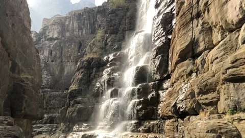 Slow motion of the waterfall flowing Stock Footage 91903095