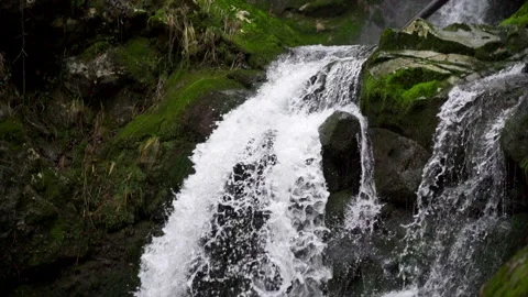 Slow motion waterfall in the forest Stock Footage 148263916