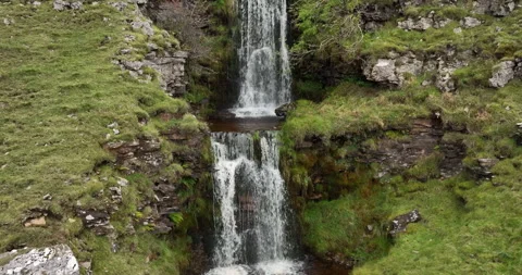 Slow motion waterfall on a hillside Stock Footage 220178056