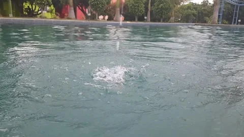 Slow Motion Waterfall into Pool Stock Footage 283448980