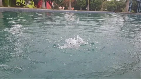 Slow Motion Waterfall into Pool Stock Footage 283449017