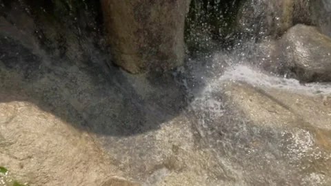 Slow motion of a waterfall splashing on limestone. Video stock 321321835