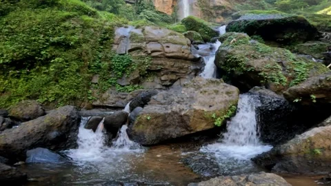 Slow motion waterfall in tropical rainforest mountains Stock Footage 319879558