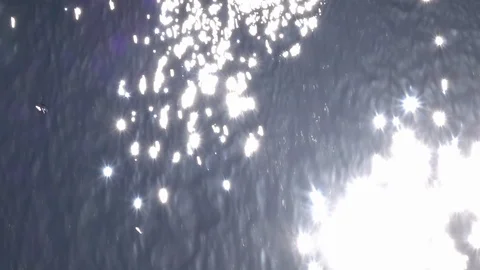 Slow motion of waterfall wall with shining sun and playing lens flare. Stock-Footage 100237188