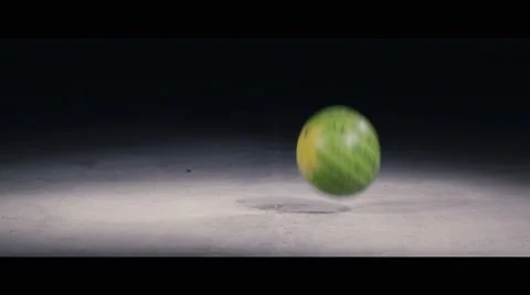 Slow Motion Watermelon Falls and Smashes on Concrete Stock Footage 42775439