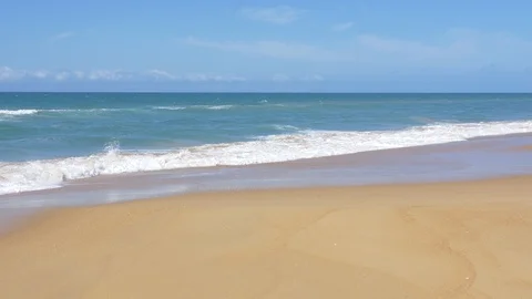 Slow motion wave crash to beach Stock Footage 87724311