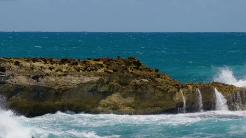 Slow motion wave crashing on rock at Peterborough Great Ocean Road Australia. Stock Footage 87249965
