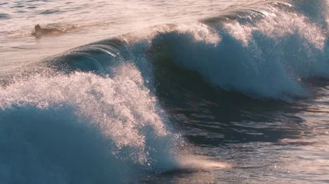 Slow Motion Wave Crashing at Sunset Video stock 68407721