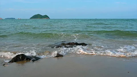 Slow motion of wave crushing coast ,  Beautiful Wave breaking over dangerous roc Stock Footage 155223620