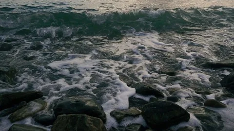 Slow motion the wave curls on the shore Stock Footage 81521478