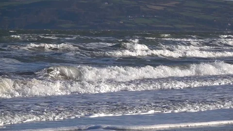 Slow motion wave rolling into the beach Stock-Footage 86053481