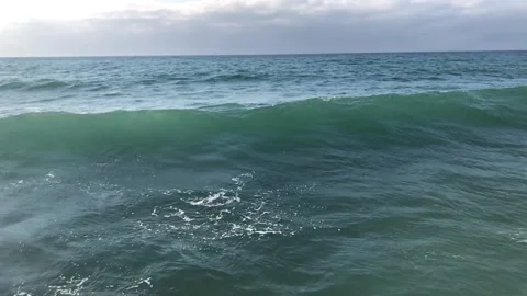 Slow motion, wave rolling towards the camera, clear mediterranean sea Stock Footage 132277250