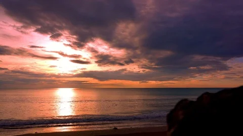 Slow motion wave sea on sand beach on sunset beauty Stock Footage 82746493