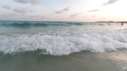 Slow motion wave sea on sand beach Video stock 123965571