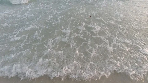 Slow motion wave sea on sand beach Stock Footage 123965589