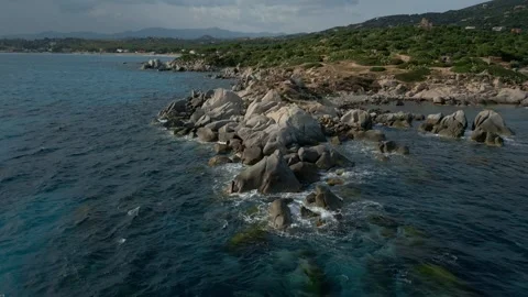 Slow motion of waves and high tide into rocks in a coast Stock Footage 245547853