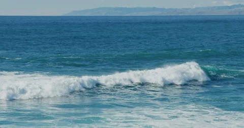 Slow motion of the waves and ocean from the bluffs at Montana de Oro State Park, Stock Footage 99146362