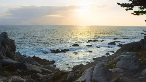 Slow motion waves backlit by sunset in Monterey California, filmed on RED camera 스톡 동영상 123562431