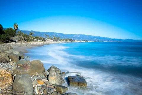 Slow motion waves on beach Stock Photos