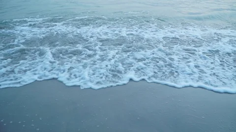 Slow-motion of waves on the beach. Tropical shore beach. Stock Footage 123360697