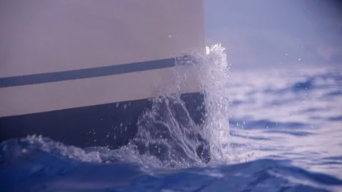 Slow motion of waves braking of sailing catamaran in summer Stock Footage 130126105