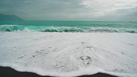 Slow Motion Waves Breaking on the Black Beach at Qixingtan, Hualien, Taiwan Stock Footage 342067443