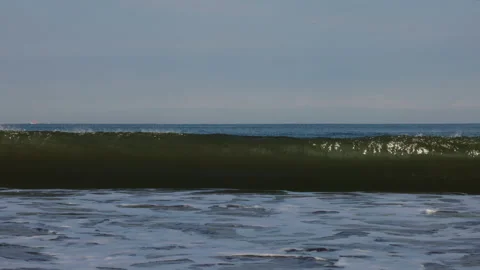 Slow Motion Waves Breaking on Mexican coast of Puerto Vallarta in Banderas Bay Stock Footage 162385896