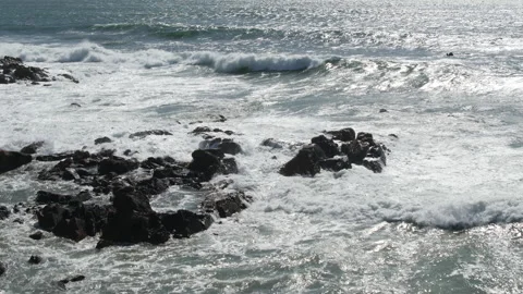 Slow motion waves breaking over rocks on Matosinhos beach, Portugal Stock Footage 271500658