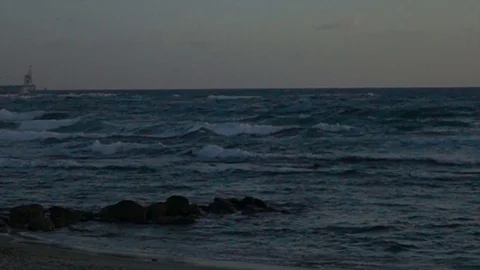 Slow Motion Waves Off Coast of Beach in Israel at Dusk Stock Footage 78211563