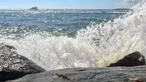 Slow motion waves crash over Florida jetties into camera lens Stock Footage 281789359