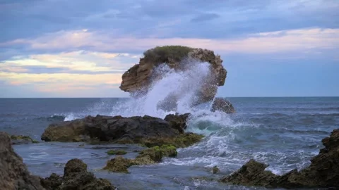 Slow Motion waves crashing aginst rocks at Cape Peron , Western Australia Stock Footage 337981617