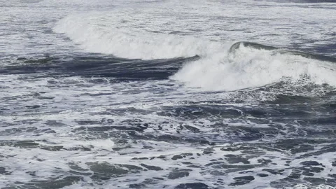 Slow motion waves crashing and breaking in Iceland ocean  4k hdr Stock Footage 279343371
