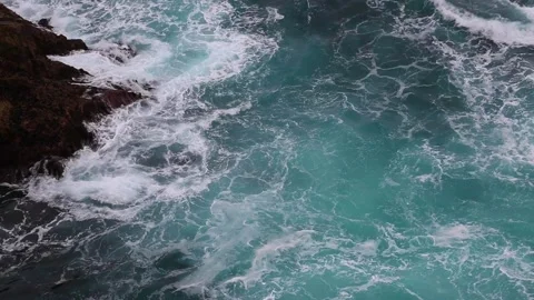 Slow Motion Waves Crashing on a Cliff Video stock 136776358